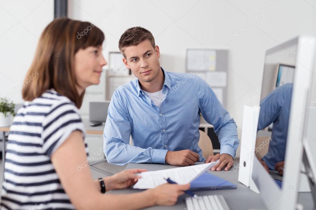 depositphotos_80111384-stock-photo-office-people-looking-at-computer